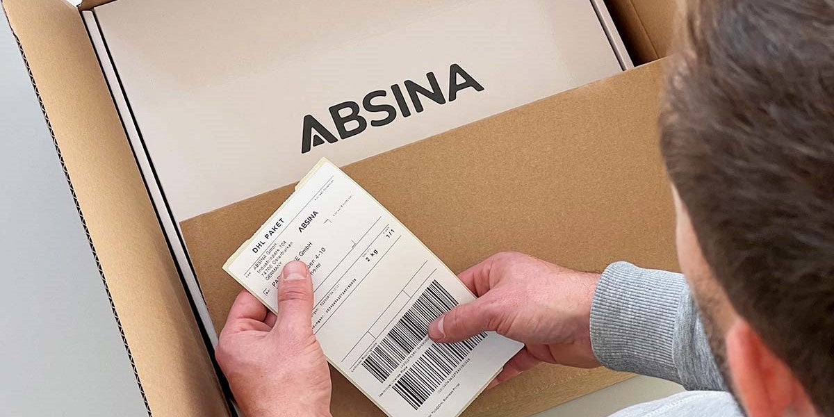 ABSINA Versand mit DHL GoGreen
